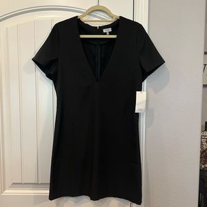 NWT Sexy Deep Cut Black dress